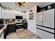 A sleek kitchen design with stainless steel appliances, butcher block countertops, and minimalist decor at 4118 Ramona Dr, Spring Hill, FL 34606