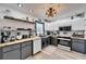 Updated kitchen featuring butcher block countertops, white cabinets, and stainless steel appliances at 4118 Ramona Dr, Spring Hill, FL 34606