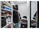 Well-organized walk-in closet with shelving and hanging storage, maximizing space and convenience at 4118 Ramona Dr, Spring Hill, FL 34606