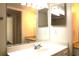 Bright bathroom featuring dual vanities and mirrors for ample space and convenience at 5400 Park N St # 200, St Petersburg, FL 33709