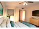 Cozy bedroom featuring ample natural light, neutral walls, and comfortable furnishings at 5400 Park N St # 200, St Petersburg, FL 33709