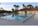 Relax by the sparkling community pool with lounge chairs and a covered cabana at 5400 Park N St # 200, St Petersburg, FL 33709