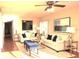 Bright living room featuring hardwood floors, neutral walls, and stylish, comfortable furnishings at 5400 Park N St # 200, St Petersburg, FL 33709