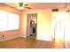 Living room featuring hardwood floors and view into kitchen at 5400 Park N St # 200, St Petersburg, FL 33709