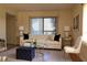 Bright living room featuring hardwood floors, neutral walls, and stylish, comfortable furnishings at 5400 Park N St # 200, St Petersburg, FL 33709
