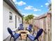 Cozy backyard seating area with a charming fire pit for relaxing evenings at 5426 Creeping Hammock Dr, Sarasota, FL 34231