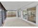 Covered patio with sliding doors bringing the outside in at 5426 Creeping Hammock Dr, Sarasota, FL 34231