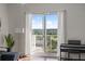 Relaxing balcony with large sliding glass doors and hardwood floors at 628 Cleveland St # 1507, Clearwater, FL 33755