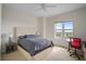Bedroom featuring a large window with views, a modern desk, and plush carpet at 628 Cleveland St # 1507, Clearwater, FL 33755