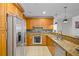 Spacious kitchen with stainless steel appliances, granite countertops, and stone backsplash at 628 Cleveland St # 1507, Clearwater, FL 33755