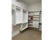 Spacious walk-in closet features custom shelving and plenty of storage space at 628 Cleveland St # 1507, Clearwater, FL 33755