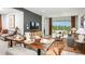 Dining area with a rustic wood table and seating for eight at 746 Steel Dr, Apollo Beach, FL 33572