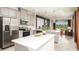 Modern kitchen with stainless steel appliances and granite counter tops at 746 Steel Dr, Apollo Beach, FL 33572