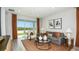 Comfortable living room with a view of the lake at 746 Steel Dr, Apollo Beach, FL 33572