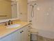 Bathroom featuring a vanity with granite counter, toilet, and shower/tub combo at 7560 Bay Island S Dr # 144, South Pasadena, FL 33707