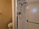 Bathroom featuring a shower with mounted shower head and updated fixtures at 7560 Bay Island S Dr # 144, South Pasadena, FL 33707