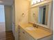 Bathroom featuring a vanity with granite counter, toilet, and shower/tub combo at 7560 Bay Island S Dr # 144, South Pasadena, FL 33707