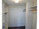 Walk-in closet featuring custom shelving and ample storage space at 7560 Bay Island S Dr # 144, South Pasadena, FL 33707