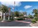 Inviting Bay Island community entrance with lush landscaping, signage, and a secure gatehouse for residents and guests at 7560 Bay Island S Dr # 144, South Pasadena, FL 33707