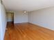 Spacious living room with gorgeous bamboo flooring and neutral walls at 7560 Bay Island S Dr # 144, South Pasadena, FL 33707