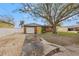 Charming single-Gathering home featuring a brick facade, bright yellow front doors, and a well-maintained front yard at 10516 94Th Pl, Seminole, FL 33772