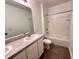 Bright bathroom featuring a tub and shower combination, complemented by a single sink and spacious vanity at 10908 Carlton Fields Dr, Riverview, FL 33579