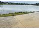 Scenic pond with ducks, offering a tranquil view, enhancing the natural appeal of the community at 10908 Carlton Fields Dr, Riverview, FL 33579