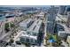 Aerial view of condo complex surrounded by tropical foliage and city views at 111 N 12Th St # 1819, Tampa, FL 33602