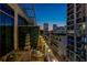 City views from a private balcony with outdoor seating and decorations at twilight at 111 N 12Th St # 1819, Tampa, FL 33602