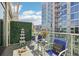 Bright balcony with city views, outdoor seating, and privacy landscaping at 111 N 12Th St # 1819, Tampa, FL 33602