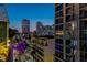 Urban twilight view featuring city skyline and street from a high-rise balcony at 111 N 12Th St # 1819, Tampa, FL 33602