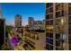 Urban twilight view featuring city skyline and street from a high-rise balcony at 111 N 12Th St # 1819, Tampa, FL 33602
