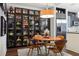 Stylish dining area featuring a round table, modern chairs, and a built-in display cabinet at 111 N 12Th St # 1819, Tampa, FL 33602