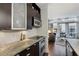 Contemporary kitchen with stainless appliances and an open view to the living area at 111 N 12Th St # 1819, Tampa, FL 33602