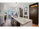 Well-lit kitchen with granite countertops, stainless steel appliances, and modern pendant lights at 111 N 12Th St # 1819, Tampa, FL 33602