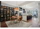 Open kitchen with a breakfast bar, pendant lighting, and a view of the dining and living areas at 111 N 12Th St # 1819, Tampa, FL 33602