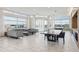 Large lounge area with modern furnishings, game table, and scenic views at 111 N 12Th St # 1819, Tampa, FL 33602