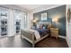 Bright main bedroom with large windows and an accent wall at 111 N 12Th St # 1819, Tampa, FL 33602