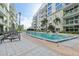 Stylish outdoor pool with palm trees and contemporary condo architecture at 111 N 12Th St # 1819, Tampa, FL 33602