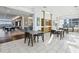Spacious recreation room offering tables, chairs, and a sleek bar area at 111 N 12Th St # 1819, Tampa, FL 33602