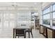 Light-filled recreation room with a table, chairs, and built-in bookshelves at 111 N 12Th St # 1819, Tampa, FL 33602