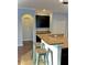Kitchen breakfast bar features granite countertops and seating for casual dining at 11566 Balintore Dr, Riverview, FL 33579
