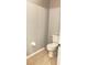 Powder room with tiled floor and standard toilet at 11566 Balintore Dr, Riverview, FL 33579