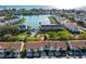 Aerial view of townhouses near a waterfront at 12308 Sun Vista W Ct # 45, Treasure Island, FL 33706