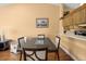 Dining area with a view to the kitchen, perfect for entertaining and Gathering meals at 12308 Sun Vista W Ct # 45, Treasure Island, FL 33706