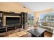 Modern living area with hardwood floors and sliding glass doors at 12308 Sun Vista W Ct # 45, Treasure Island, FL 33706