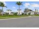 Beautiful modern home exterior featuring lush landscaping and a well-maintained lawn in a desirable community at 17441 Savory Mist Cir, Bradenton, FL 34211