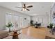 Bright and open living room with modern furnishings and hardwood floors at 209 Seahorse Se Dr # D, St Petersburg, FL 33705