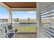 Inviting patio with seating offers serene views of the lake at 209 Seahorse Se Dr # D, St Petersburg, FL 33705