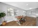 Bright dining area featuring hardwood floors, and ample natural light from large windows at 3104 Bay St, Sarasota, FL 34237